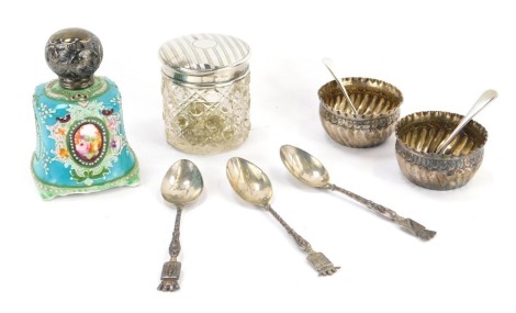 A group of small silver, to include a pair of Victorian silver open salts, London 1890, with spoons, in presentation box, three French silver souvenir spoons, dressing table bottle, etc. (a quantity)