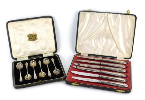 A set of six George V silver coffee spoons, with tapering handle, Sheffield 1925, 1.86oz, in fitted box, together with a set of six silver handled butter knives, in presentation case.