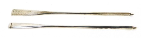 Two silver presentation oars, one engraved HMS Alert, possibly 1948, date rubbed, the other bearing no inscription, each marked Sterling Silver, 0.58oz, 20.5cm long. HMS Alert was commissioned for service on 24th October 1946, and arrived at Singapore, h