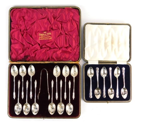 A cased set of six silver plated teaspoons, and a cased set of twelve Mappin and Webb silver plated Apostle spoons and sugar tongs, in fitted case. (AF) (2)