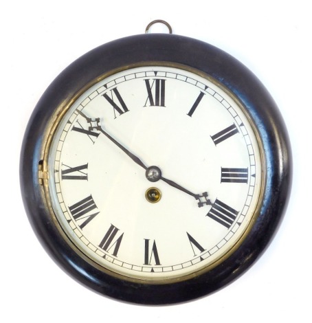 A late 19thC wall clock, the circular white enamel dial bearing Roman numerals, thirty hour, in a circular ebonised case, key wind, 27cm diameter.