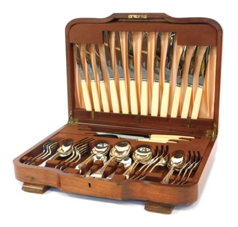 A Waring and Gillow canteen of cutlery, for six place settings, contained in an oak case, 44cm wide.