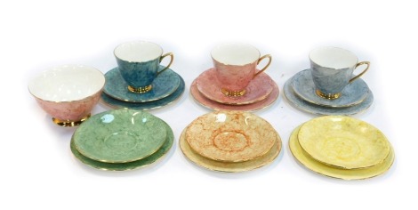 A group of Royal Albert porcelain teawares decorated in the Gossamer pattern, comprising three teacups, six saucers, sugar bowl and six sandwich plates.