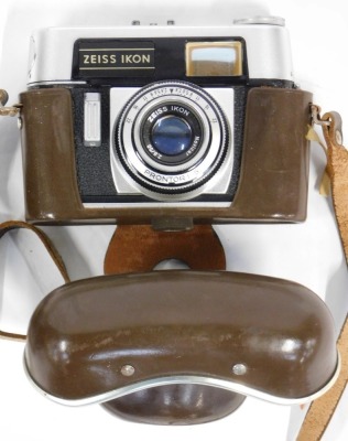 A Zeiss Ikon Colora F camera, in leather case, together with a Brownie camera, a Marshall Barty Drapers wooden metre rule, and a pick cutter. - 3