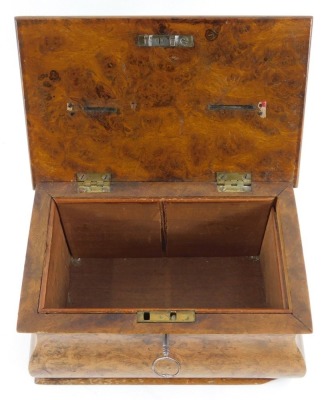 An early 20thC oak and inlaid mantel clock, the circular enamel dial bearing Arabic numerals, 14cm high, together with a Georgian burr wood tea caddy converted as a money box, with two holes to the top for coins, with key, 20cm wide. - 5