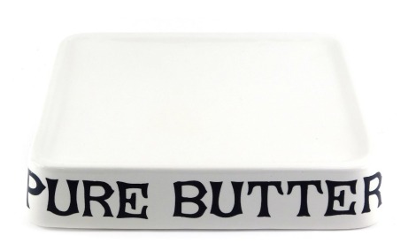 A late 20thC ironstone butter slab, decorated with typography to the front for PURE BUTTER, 34cm wide.