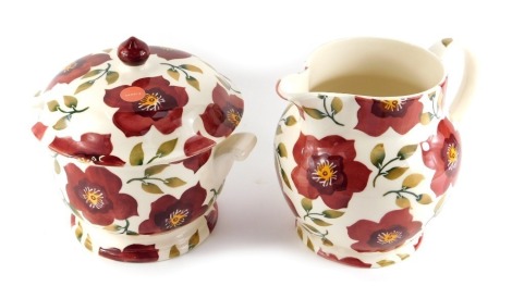 An Emma Bridgewater pottery 6 pint jug, decorated in the Christmas Rose pattern, second quality, 23cm high, together with a matching tureen and cover, 24cm high, marked Sample. Emma Bridgewater sample pieces specially decorated as demonstration or instruc