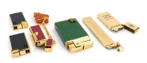 Six assorted pocket lighters, comprising a IPM special filter Benson and Hedges pocket lighter, two Partner half SFR lighters, a Mine red cased lighter, a Royal Musical green cased lighter, and a Monarch brass cased lighter. (6)