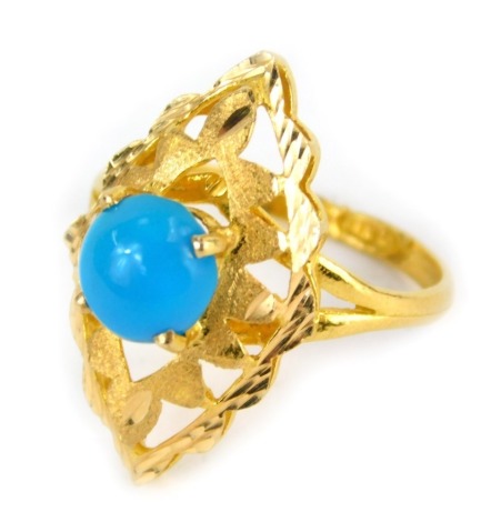 An Eastern turquoise set dress ring, the turquoise in four claw setting, on marquee shaped pierced mount, on yellow metal band, with rubbed markings, size L, 4.0g all in.