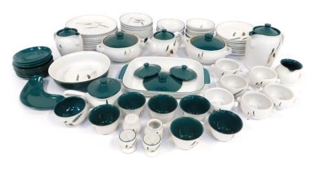 A Denby stoneware part tea and dinner service, decorated in the Green Wheat pattern, to include teapot, hot water jug, two tureens and covers, dinner plates, egg cups, tea cups and saucers, etc. (a quantity)