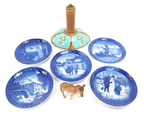 A set of five Royal Copenhagen Christmas plates, various dates from 1970s and 1980s, printed marks, each 18.5cm diameter, together with a Beswick pottery model of a donkey, 11cm high, and a pottery lamp base, 22cm high. (7)