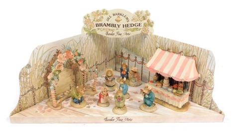 A Border Fine Arts Brambly Hedge The Wedding Collection set, comprising Poppy Eyebright (bride), Dusty Dogwood (groom), Old Vole, Wilfred, Primrose, Conker, floral arch, wedding table and canopy, Mr Apple proposing a toast, and Lady Woodmouse eating cake,