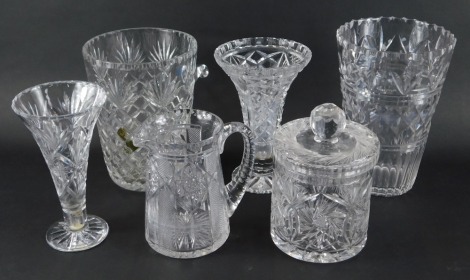 A group of cut glass ware, to include an Irena two handled champagne bucket or wine cooler, 23cm high, vase of cylindrical tapering form, 24cm high, jug, 17cm high, jar and cover, 22cm high, etc. (a quantity)