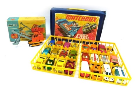 A Corgi diecast Priestman Luffing Shovel, 1128, boxed, together with a Matchbox carry case, containing various cars.