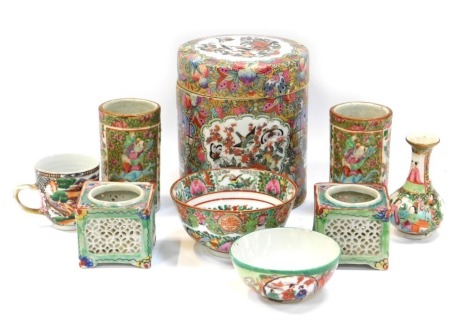 A group of 20thC Chinese famille rose and other Oriental porcelain, to include cylindrical jar and cover, 15cm high, two cylindrical vases, 11cm high, etc. (many pieces AF)