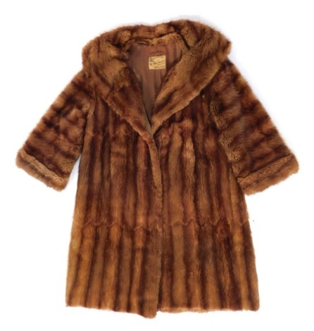 An M Michaels Furriers Ltd fur 3/4 length coat, underarm measurement 40cm.