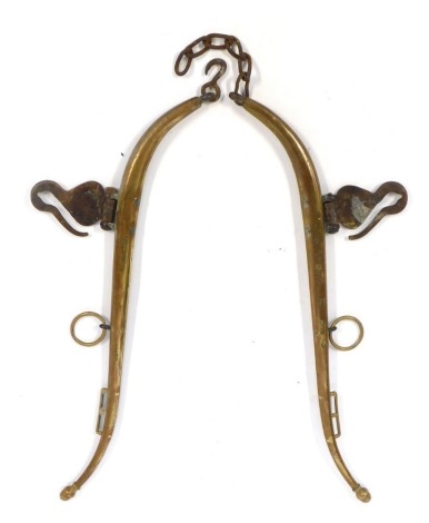 A pair of brass horse hames, stamped Solid Brass No 7, each 76cm long.