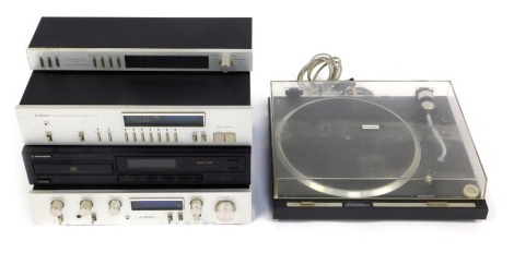 A Pioneer music system, comprising stereo tuner TX-710L, compact disc player PD-4300, stereo amplifier SA-510, Audio Digital timer, turntable PL-300X.