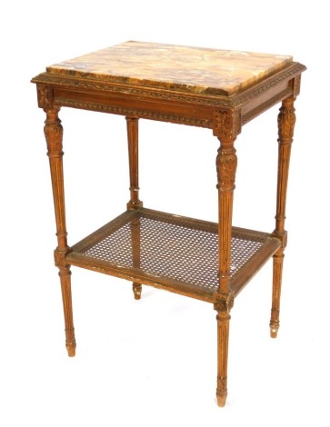 A French gilt marble topped side table, the rectangular marbled top in a giltwood inset, with bergere base, 79cm high, 50cm wide, 40cm deep.