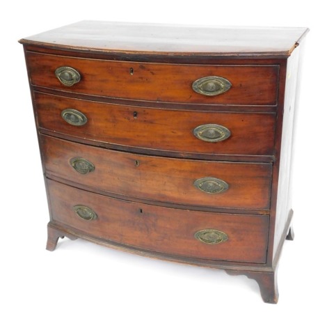 A 19thC mahogany bow front, chest of four long drawers, with brass lion mask handles, on bracket feet, 92cm high, 97cm wide, 53cm deep. (AF)