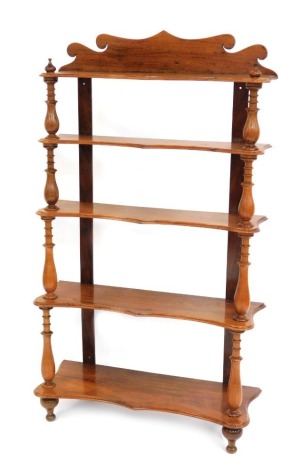 A Victorian walnut five tier whatnot.