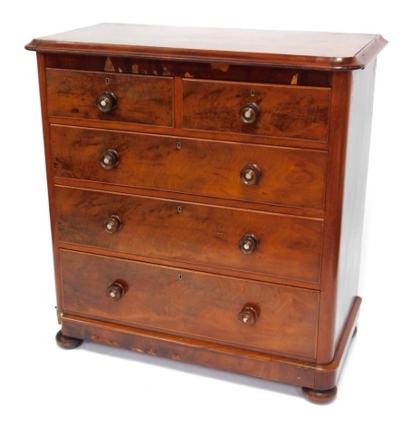 A 19thC mahogany chest, of two short and three long drawers, with moulded top, knob handles with mother of pearl inlay, on bun feet, 110cm high, 101cm wide, 52cm deep. (AF)