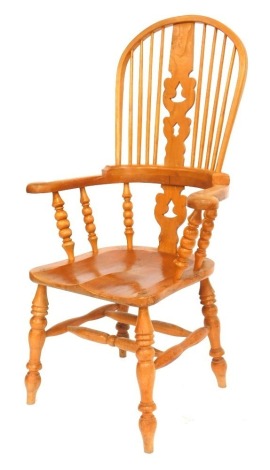 A beech stick back Grandfather chair, with pierced splat and double H stretcher.