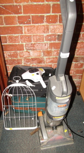 A Vax dual power upright carpet cleaner, together with a Silver Crest Mites vacuum cleaner, and two suitcases. WARNING! This lot contains untested or unsafe electrical items. It is supplied for scrap or re-conditioning only. TRADE ONLY