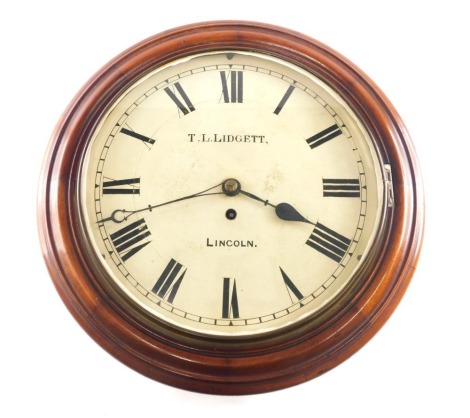 A Victorian mahogany wall clock, the painted dial signed T.L. Lidgett Lincoln, with a brass fusee movement, 41cm diameter.