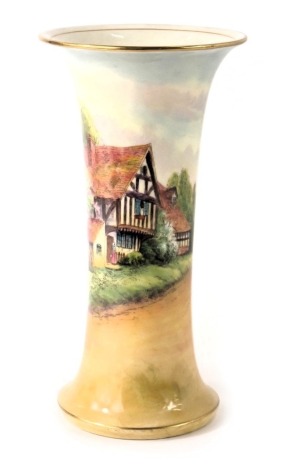 A Royal Worcester porcelain wasted cylindrical vase, painted with a cottage within landscape, signed by Rushton and showing Cropthorne, printed marks in puce to underside and shape number G923, 42cm high.