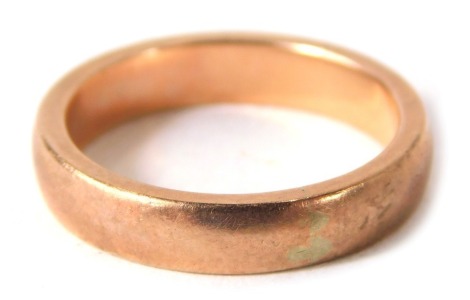 A 9ct gold rose gold wedding band, of plain design, ring size I½, 3.4g all in.