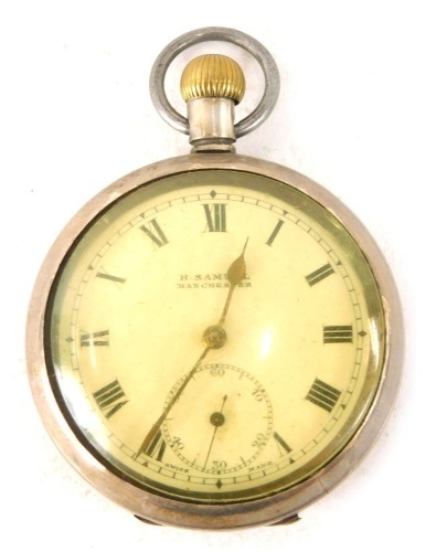 A H Samuel of Manchester silver pocket watch, the white enamel dial with Roman numeric border, seconds dial and gold hands, with import marks and numbered 1333557, 80.4g all in.