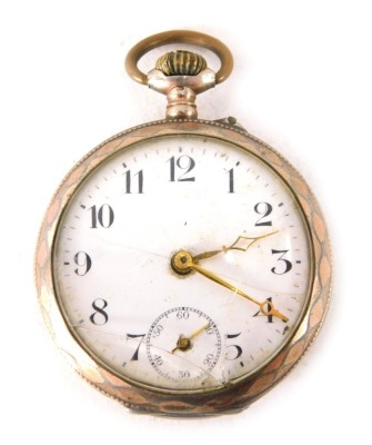 A Remontoir Cylindre continental white metal fob watch, with white enamel numeric dial, seconds dial and hands, with hammered outer casing and vacant cartouche, with six rubis movement, white metal stamped 800, 62g all in. (AF)