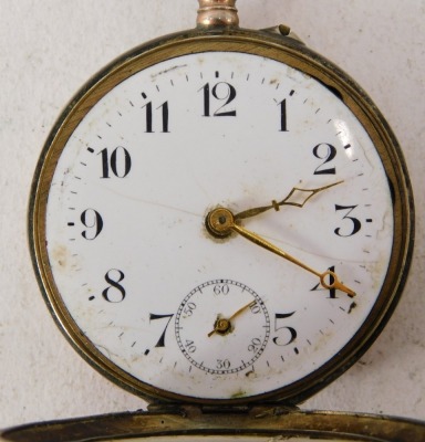 A Remontoir Cylindre continental white metal fob watch, with white enamel numeric dial, seconds dial and hands, with hammered outer casing and vacant cartouche, with six rubis movement, white metal stamped 800, 62g all in. (AF) - 2