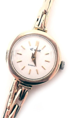 A 9ct gold cased Ingersoll ladies wristwatch, with a white enamel dial, on expanding bracelet, 2cm diameter, 11.9g all in.