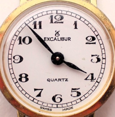 An Excalibur ladies wristwatch, in a gold plated case, with stainless steel back numbered 6002, on a plated bracelet. - 2