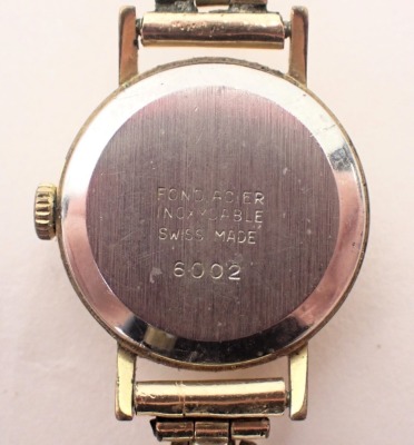 An Excalibur ladies wristwatch, in a gold plated case, with stainless steel back numbered 6002, on a plated bracelet. - 3