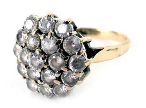 A 9ct gold cluster ring, with three layers of CZ stones, in a raised basket setting, ring size L, 3.7g all in.