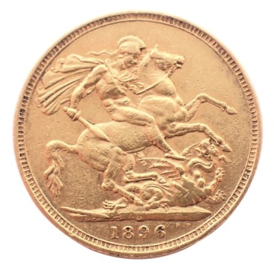 A Victorian full gold sovereign dated 1896.