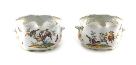 A pair of Dresden porcelain oval jardiniere or monteith, each decorated with birds, within gilt borders, Pseudo Augustus Rex marked underside, 20cm wide.