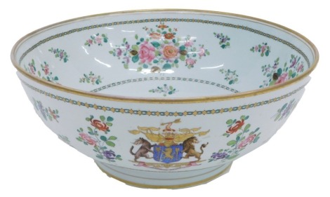 A late 19th/early 20thC Samson porcelain bowl, decorated with oriental style flowers, etc., within gilt borders, unmarked, 32.5cm diameter.