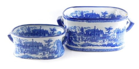 A late Oriental porcelain two handled foot bath, printed in blue, 43cm wide, and another similar, 34cm wide. (2)