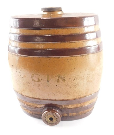 A 19thC brown stoneware ovoid spirit barrel, indistinctly painted in gilt Gin, 32cm high.