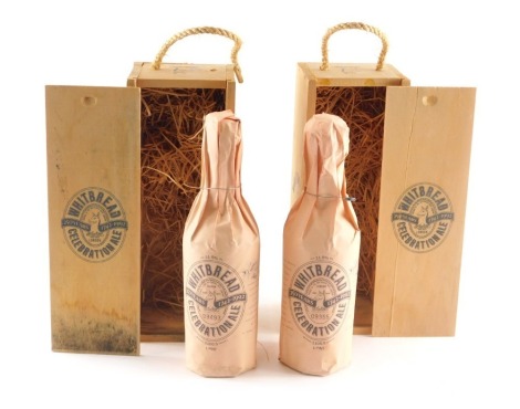 Two bottles of Whitbread 250 Years Celebration ale, each containing a pint, in original wooden case.