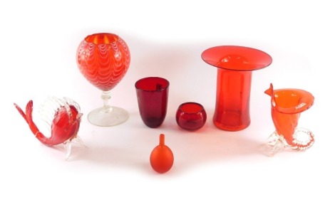 A ruby tinted art glass vase, with flared rim, 21cm diameter, a Murano fish, a red tinted goblet with trailed decoration and clear glass knopped stem and domed foot, 26cm high, etc.