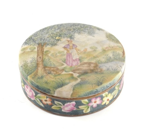 A German porcelain box and cover, with textured finish, painted with a lady within a landscape, the base with a floral border, indistinct cross marked underside, 15cm wide.