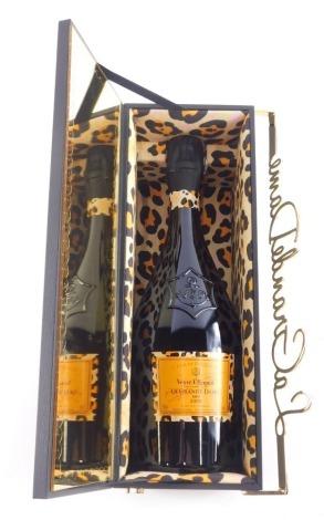 A bottle of Veuve Clicquot la Grande Dame 2006 champagne, by the shoe designer Charlotte Olympia, in fitted box with outer packaging.