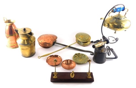 A quantity of brass and copper ware, to include an Arts and Crafts kettle, on wrought iron stand, a flagon, two chestnut roasters, blow torch, etc.