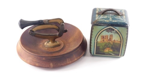 A turned wooden gold painted nutcracker and bowl, with plastic handle, and an Edward Sharp and Sons toffee tin, decorated with scenes of Durham, Lincoln, Litchfield and Liverpool Cathedrals.