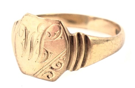 A 9ct gold signet ring, the rectangular panel bearing the initials JM with stepped shoulders, ring size R, 2.7g all in, boxed.